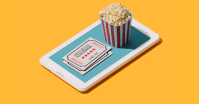 popcorn and movie tickets on an e-reader