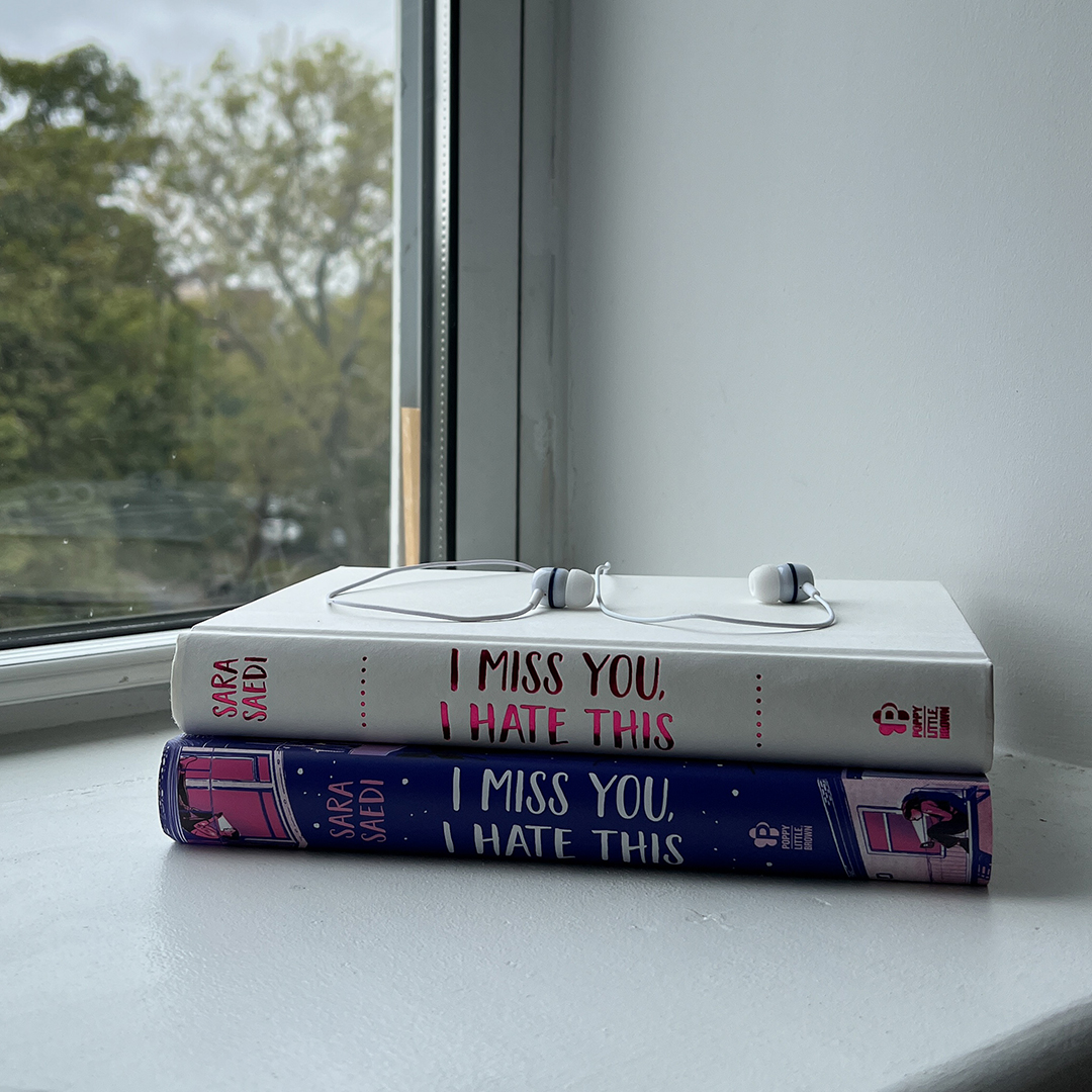 Instagram image of the hardcover spines of the book "I Miss You, I Hate This" by Sara Saedi