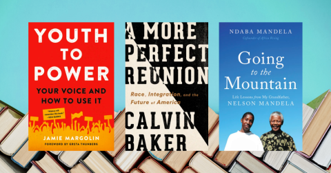 three books on a background of books