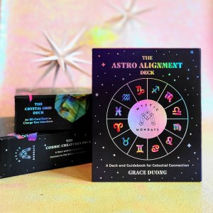 Photo of three Mystic Mondays decks: the Astro Alignment, Cosmic Creatures, and Crystal Grid decks.