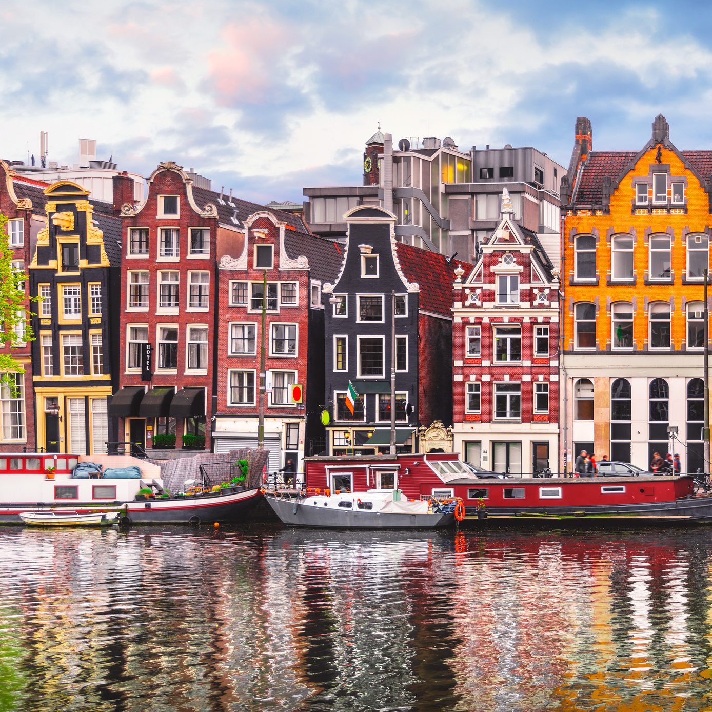 Colorful houses in Amsterdam overlooking the Amstel River