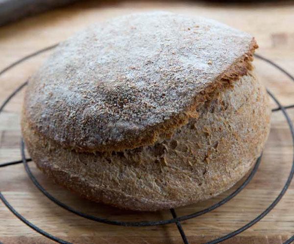 Photo of a loaf of break © Keller + Keller Photography, excerpted from Cooking with Fire