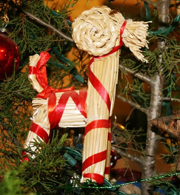 Photo of a straw goat Christmas tree ornament.