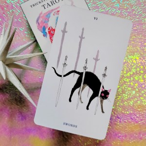 Photo of the Six of Swords card from the Trickster's Journey deck