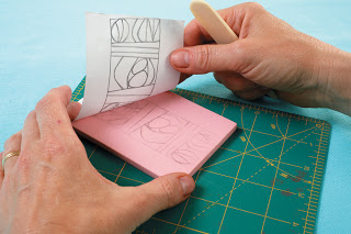 Step 2 - Transfer the design by laying the paper drawing side down on the block