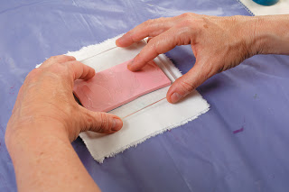 Step 6: Press the stamp onto your fabric.