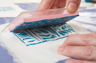 Step 7: If the stamp is small, lift it straight up and off the fabric.