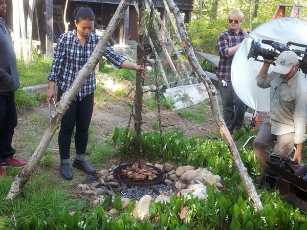 paula-marcoux-cooking-with-fire-on-man