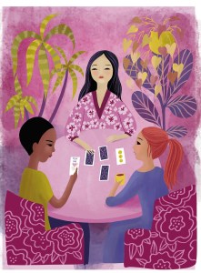 Illustration from "The Junior Tarot Reader's Handbook" showing three young girls sitting at a table reading cards