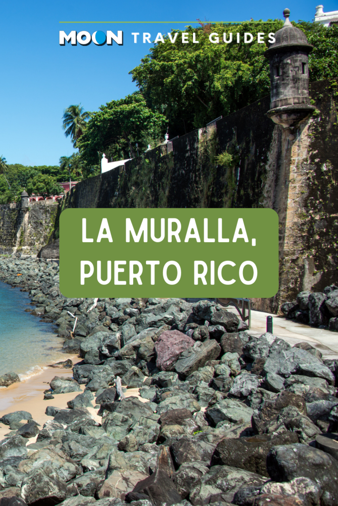 Image of stone wall along beach with text La Muralla, Puerto Rico