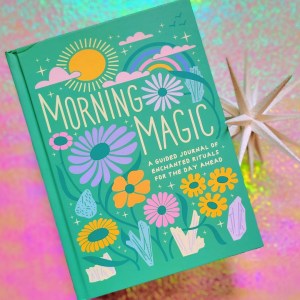 Photo of “Morning Magic” laid next to a decorative white starburst above a pink and green iridescent background