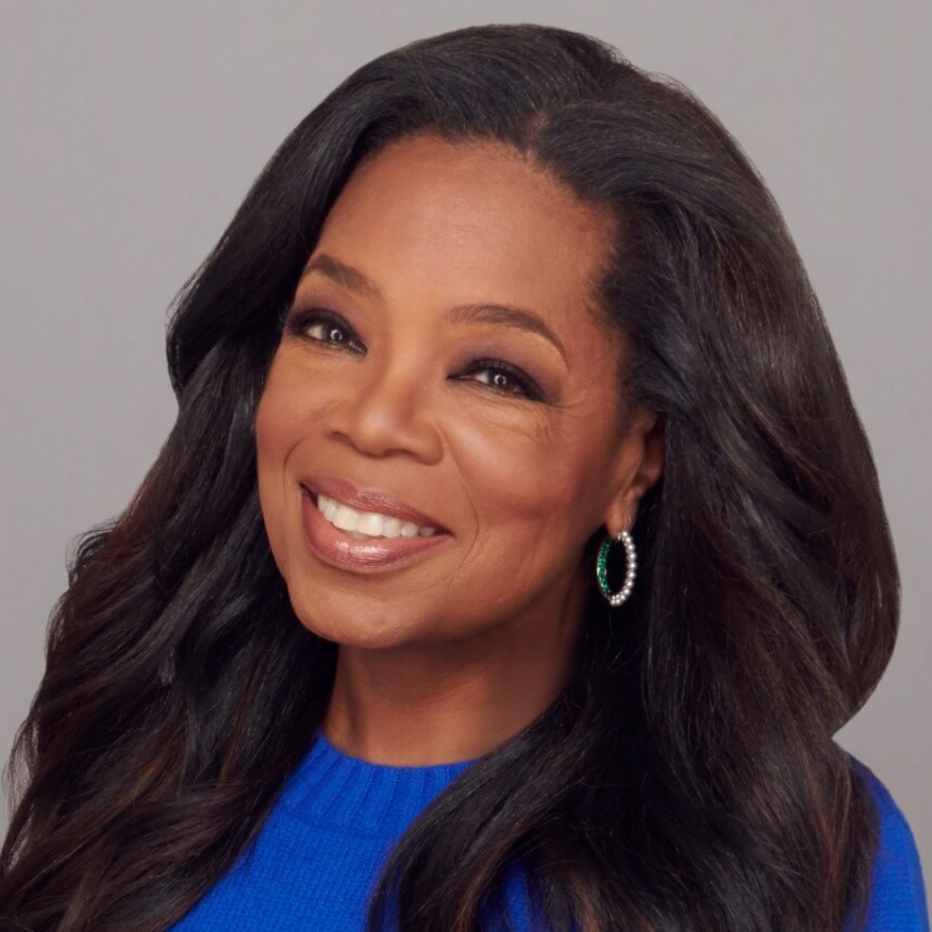 Photo of Oprah Winfrey against a gray background