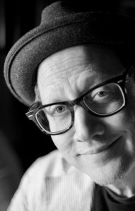 black and white photo of author and comedian Rob Schneider