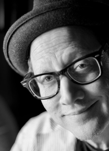black and white photo of author and comedian Rob Schneider