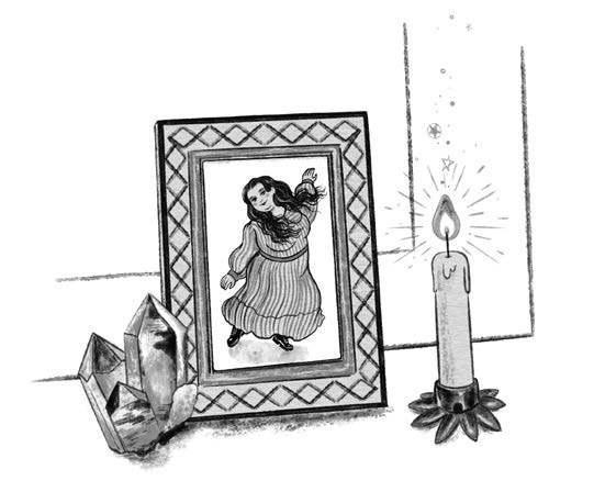 Line illustration of a framed photo next to crystals and a candle, from "make your own magic"