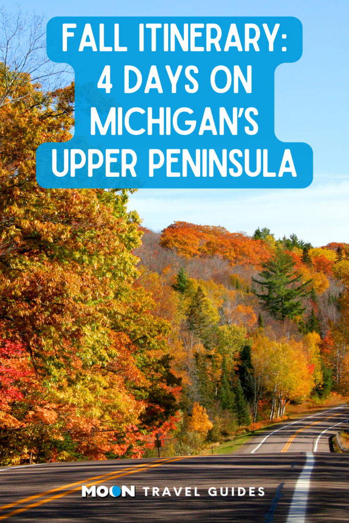 Image of road bordered by colorful fall trees and text Fall Itinerary: 4 Days on Michigan's Upper Peninsula