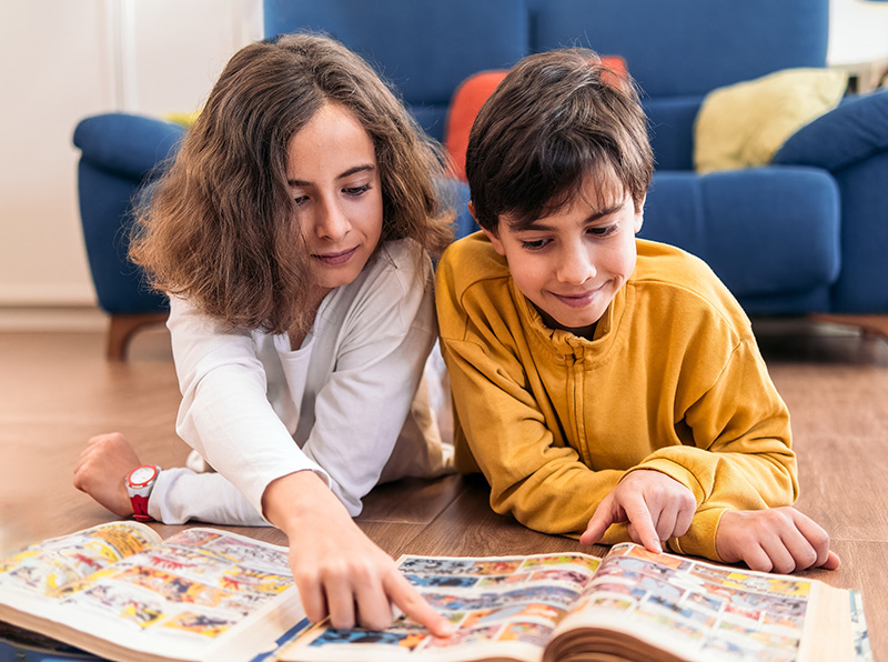 Kids reading graphic novels