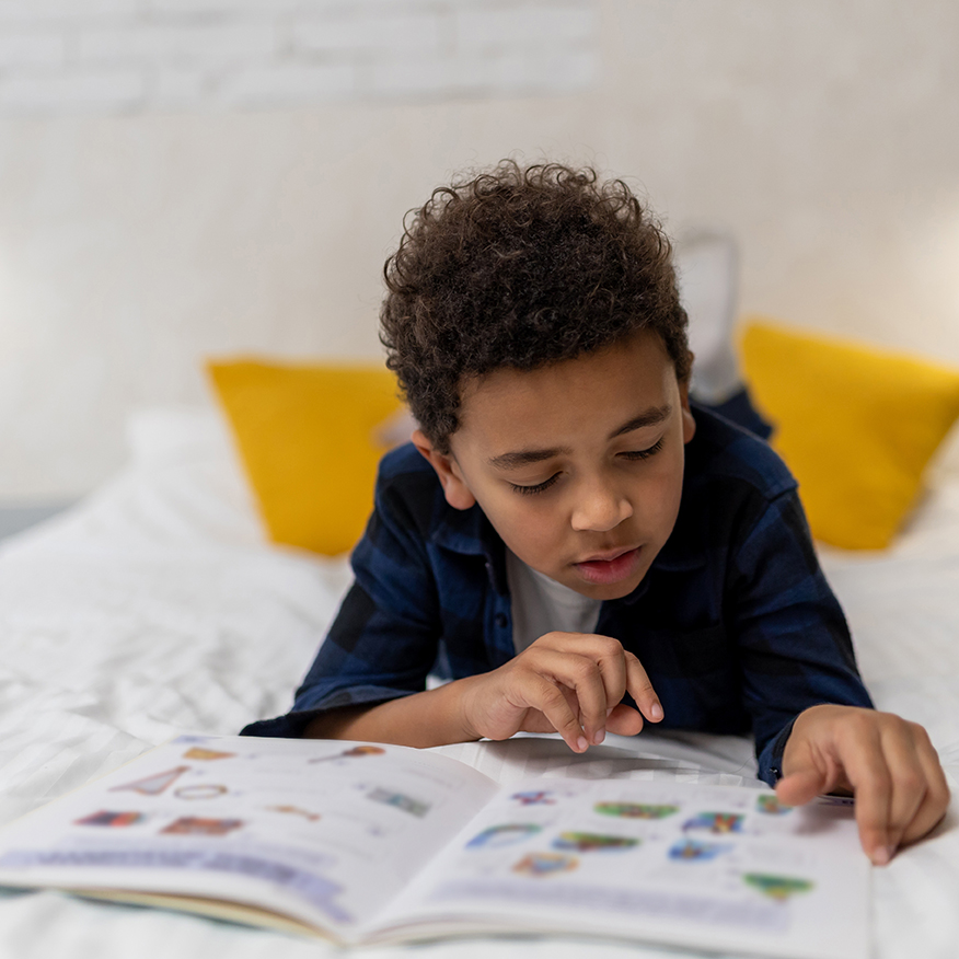 Boy reading a book