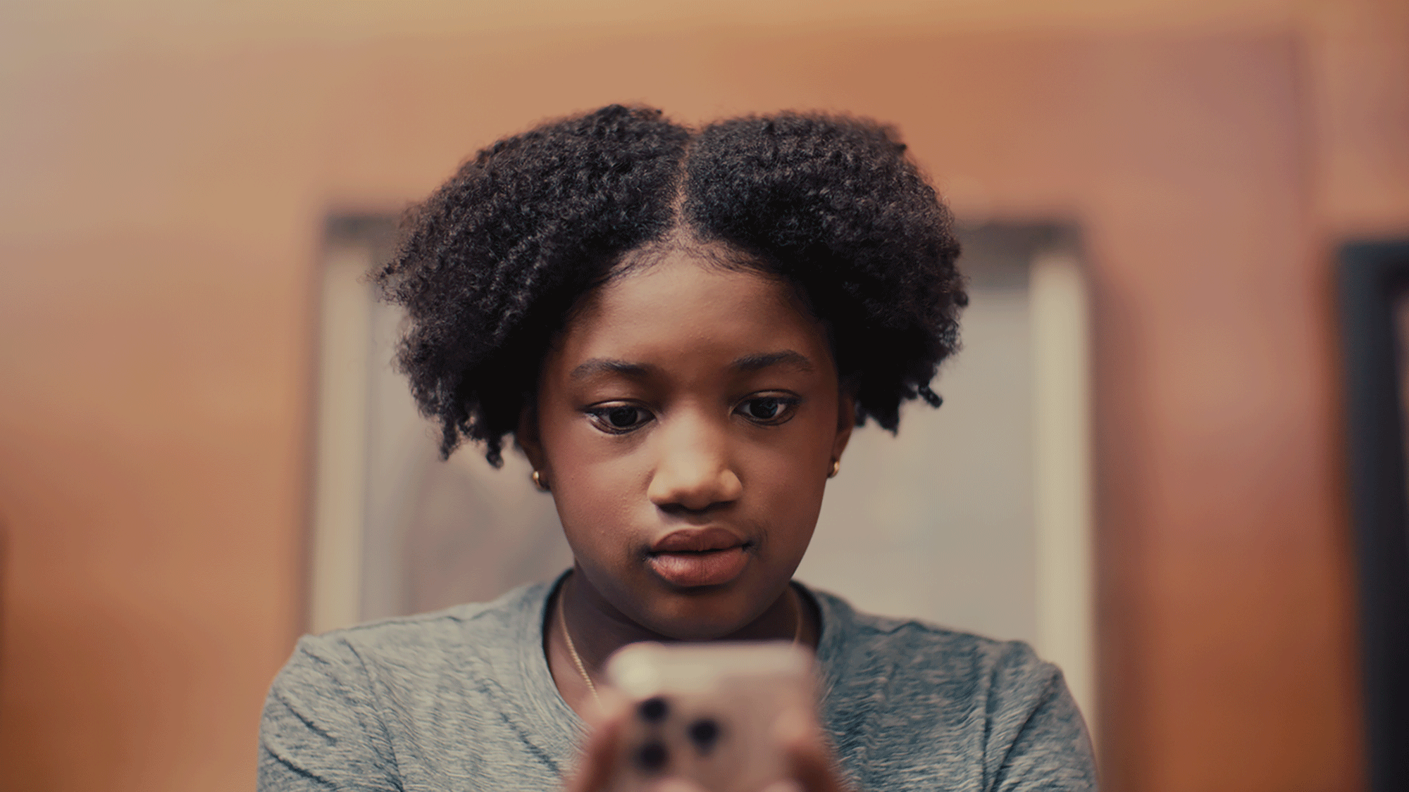 A girl looking at her phone