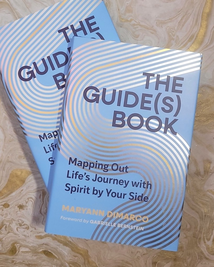 Photo of two copies of The Guide(s) Book