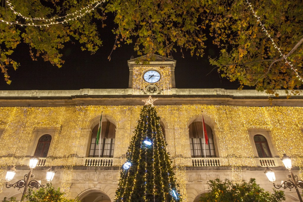 a glowing winter holiday market in Seville