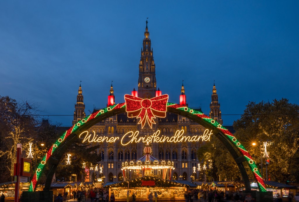 a glowing winter holiday market in Vienna