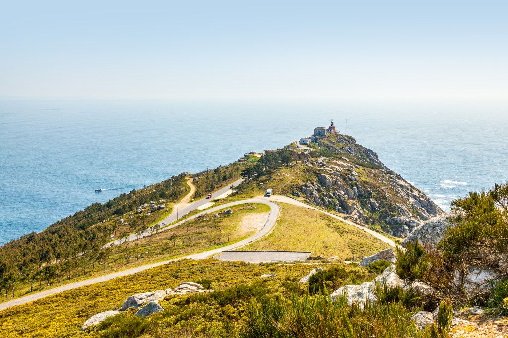 A trail leading to rocky promontory overlooking the sea