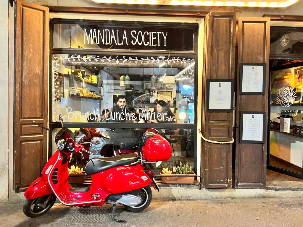 A scooter sits in front of Mandala Society in Marrakesh
