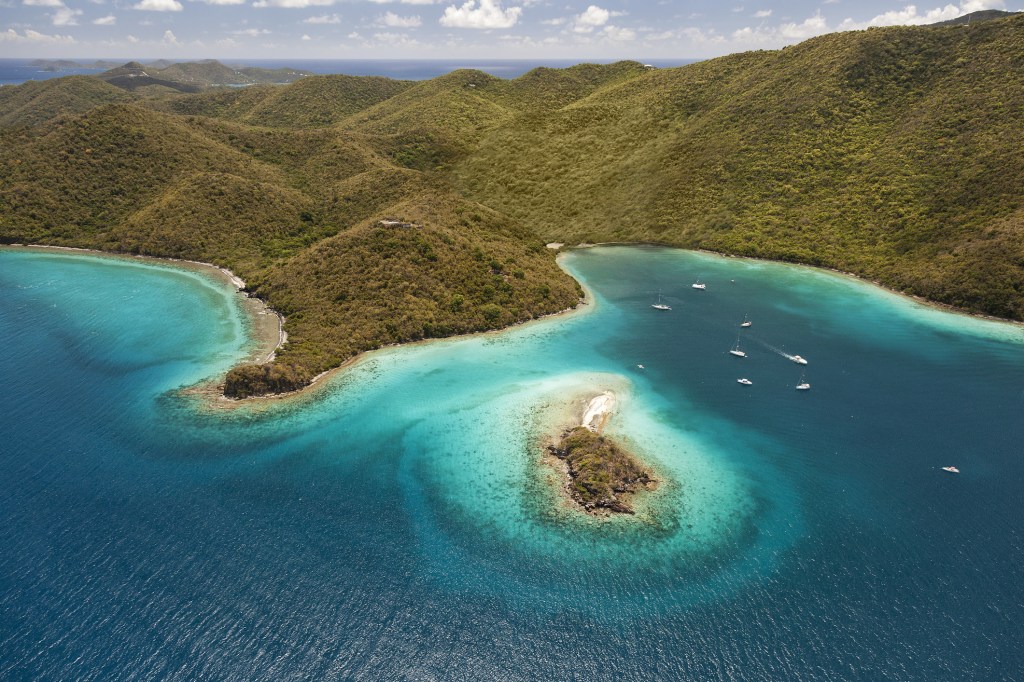 a small cay surrounded by a fringing reef
