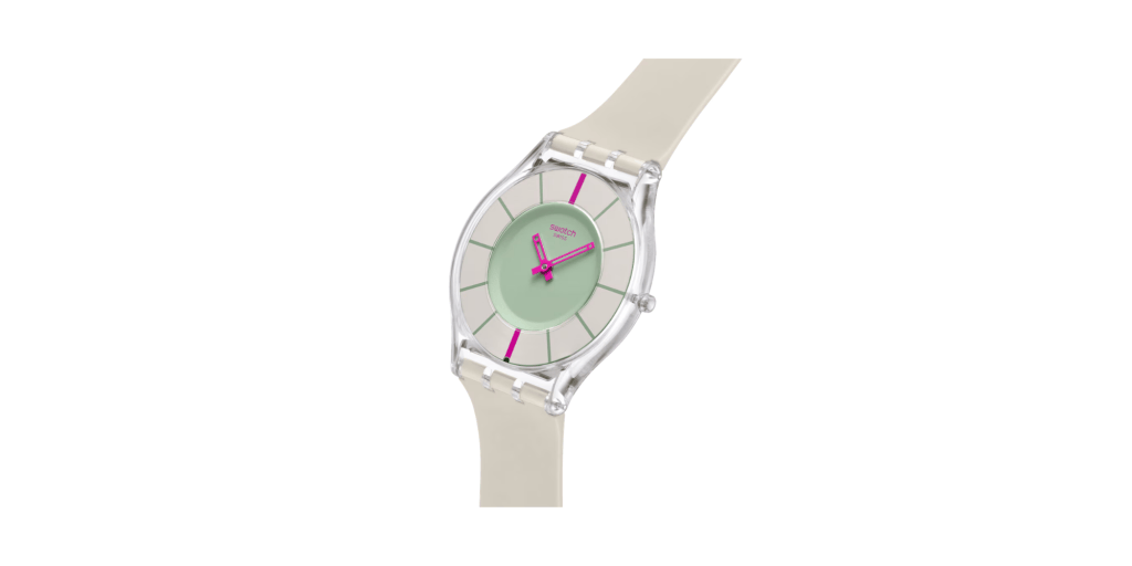 a light colored watch with pops of mint and hot pink on the face/hands